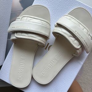 DIOR Cannage Quilted Slides in White.